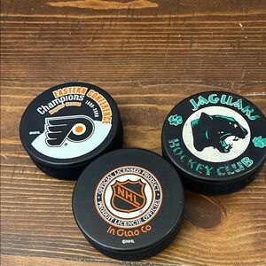 NHL Hockey Pucks Set